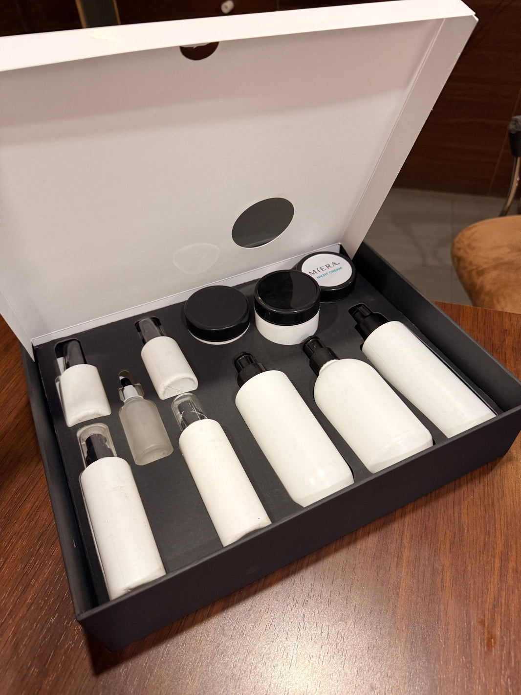 Printwell rigid box packaging samples for ceramic tiles, luxury desserts, and premium cosmetics.