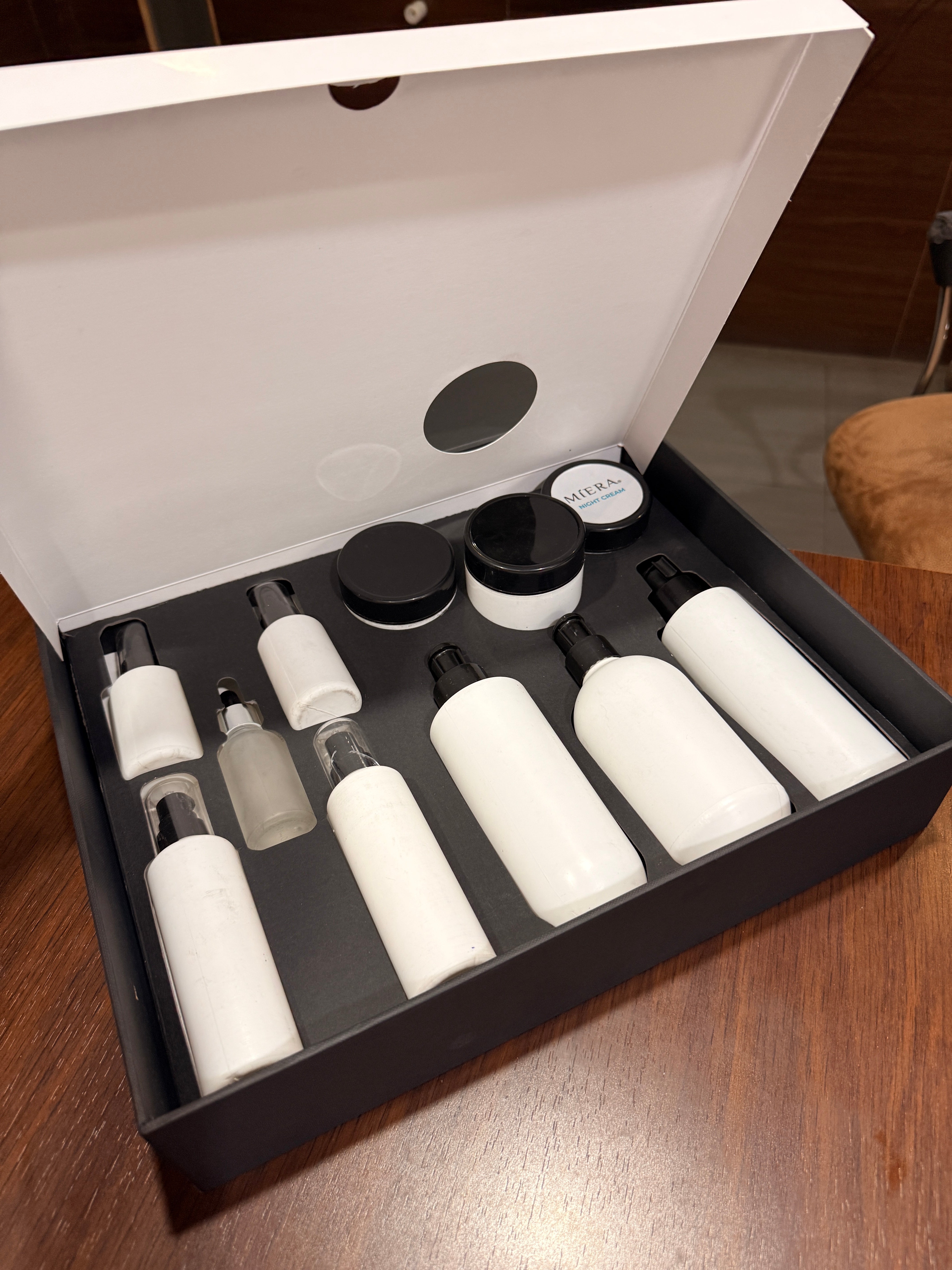 Printwell rigid box packaging samples for ceramic tiles, luxury desserts, and premium cosmetics.