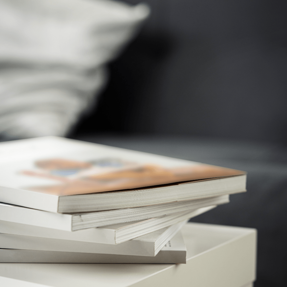 Binded magazines on table