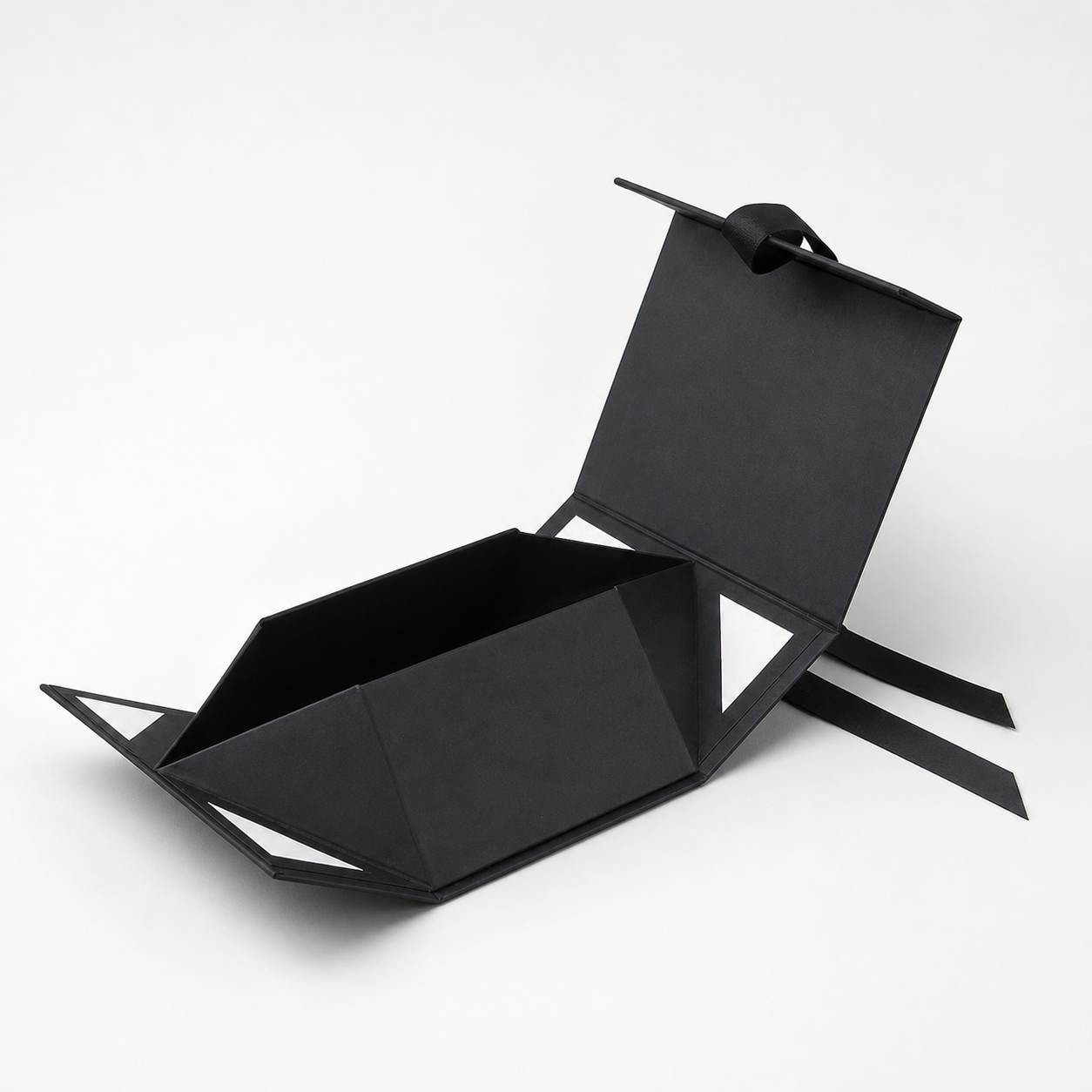 Black collapsible rigid box with ribbon handle for luxury gifting and brand packaging
